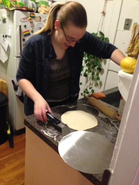 Kelly, rolling out some dough